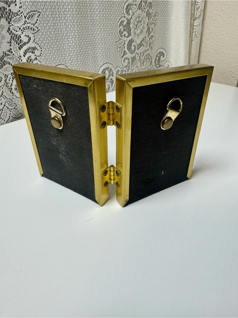 Vintage Gold Colored Solid Brass Double Hinged Picture Frame. Each is 2”x3”.